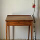 Old schoolboy walnut desk