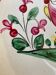 Antique plate with a flower and rooster pattern.