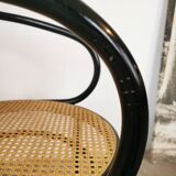 Curved wood and cane armchair called "Le Corbusier"