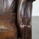 Vintage sheepskin armchair in a dark cognac colour with a comfortable seat