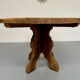 Round table in solid wood, thick top, vintage brutalist style from the 1960s.