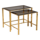 Nested tables in brass and smoked glass.