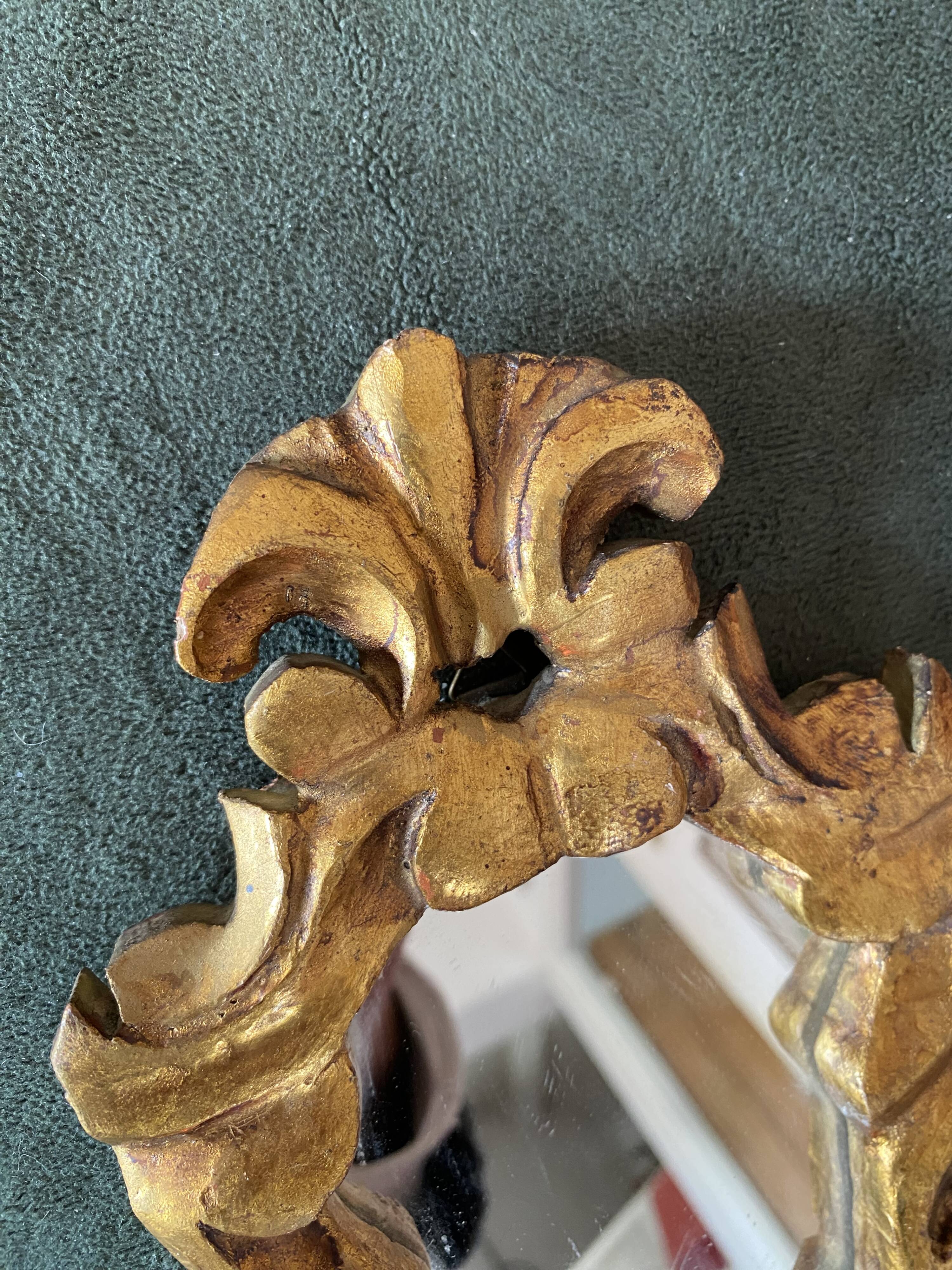 Small baroque gilded wood mirror.