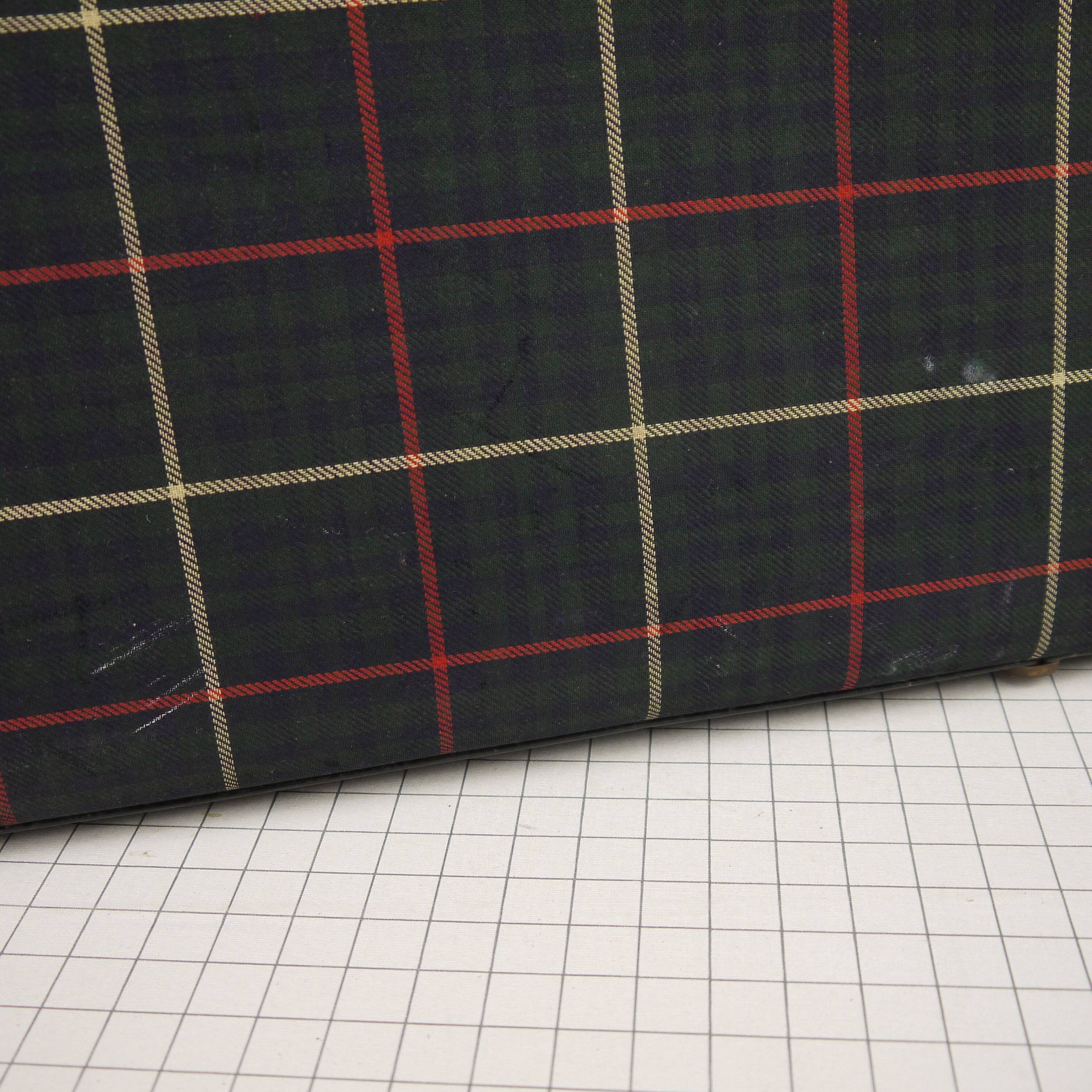 Green scottish fabric case with key