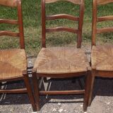 17 old straw chairs