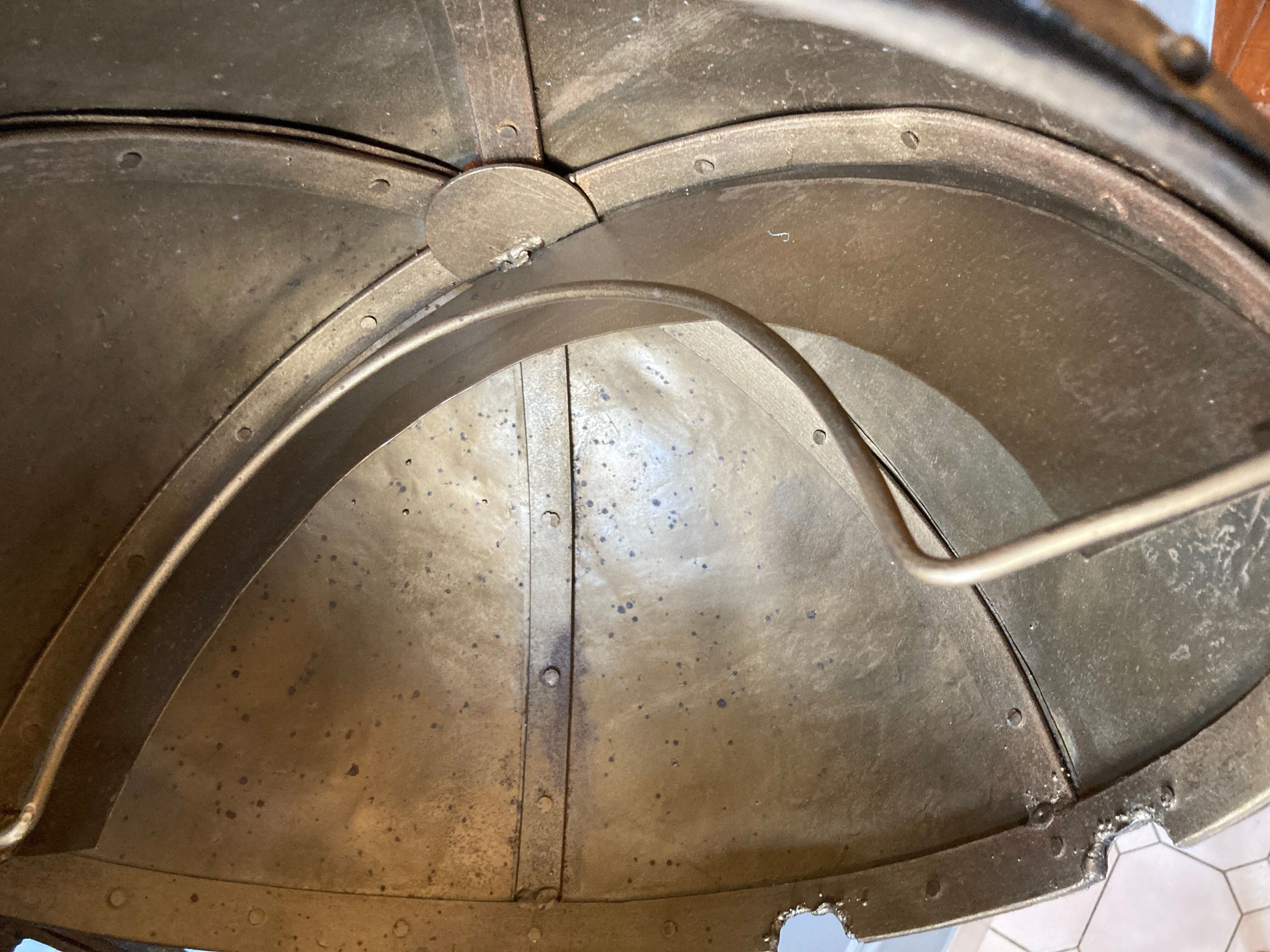 Atypical industrial furniture riveted sphere