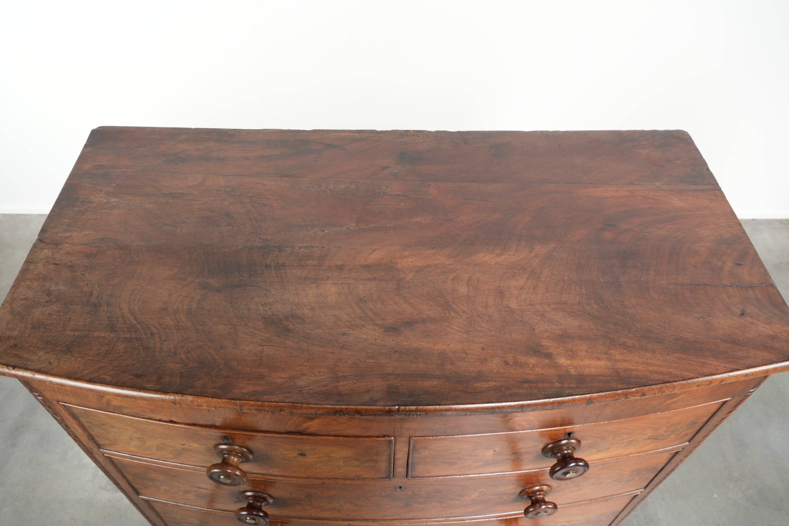 Antique 19th century English chest of drawers/commode with bow front