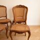 Set of 4 Regency chairs in caned cherry wood.