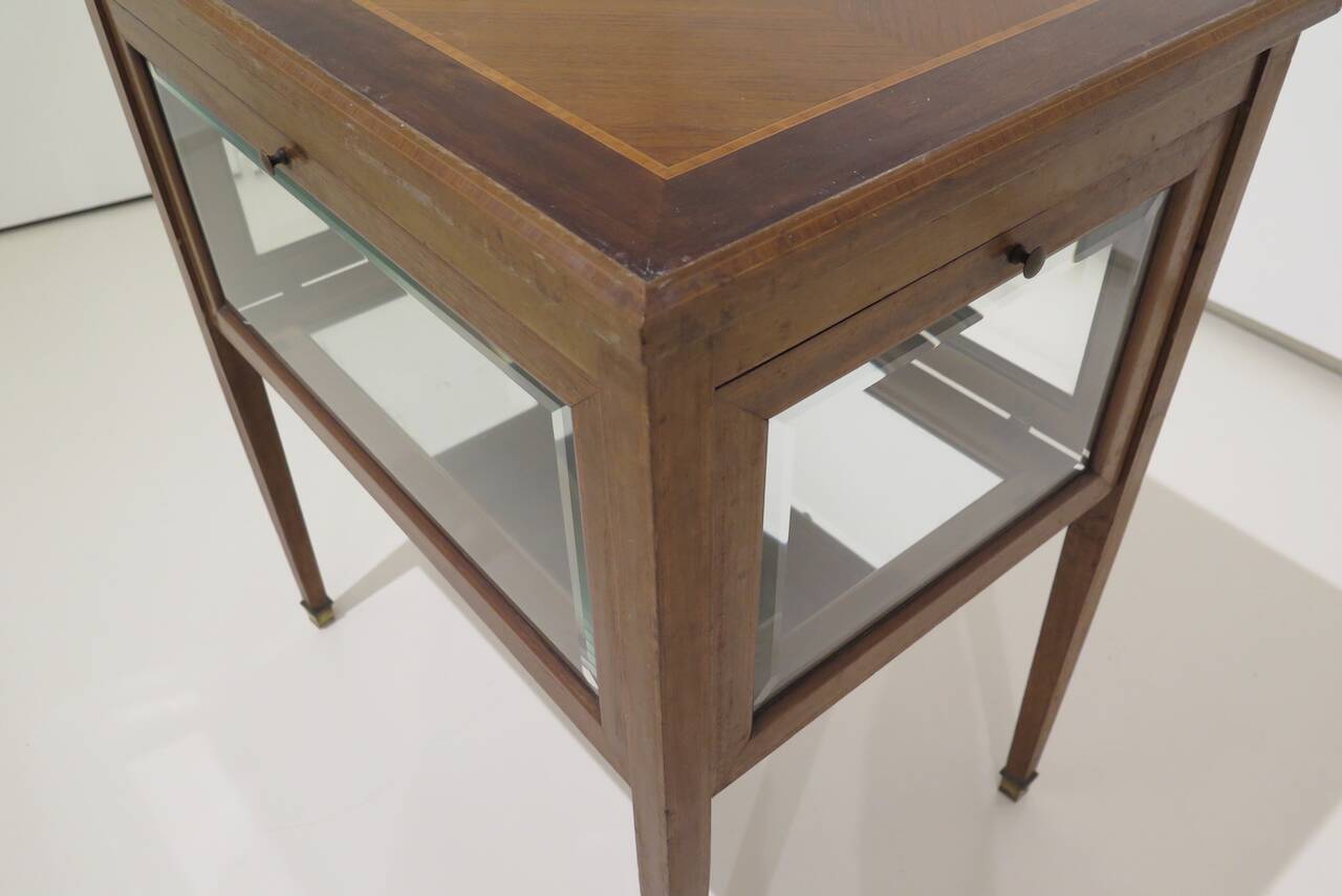 Marquetry table with display case