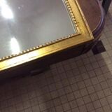 Miroir en bois et stuc doré