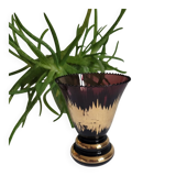 Flared vase in purple glass with a central gold motif