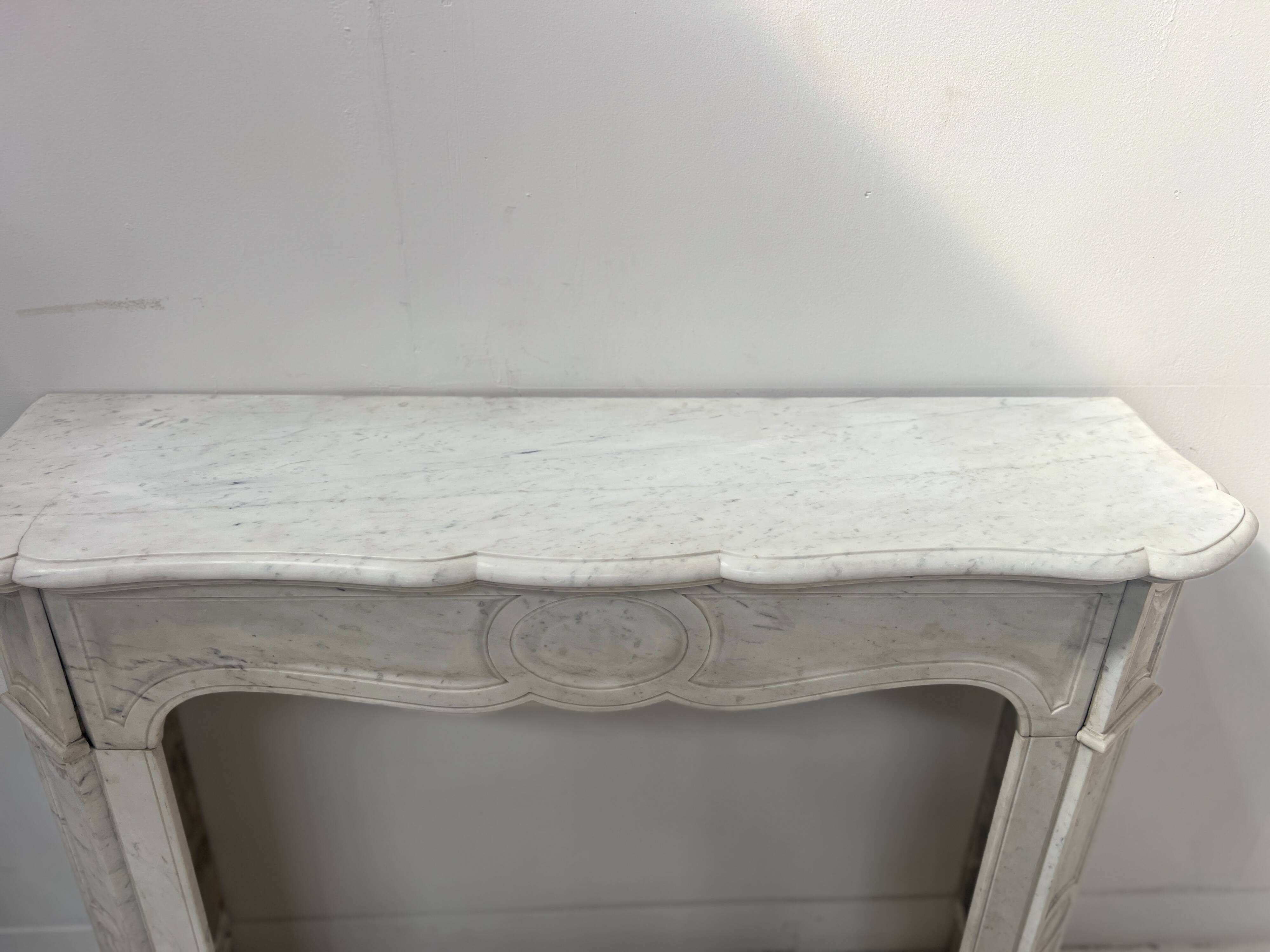 Louis XV style fireplace Model Pompadour White Carrara marble 20th century