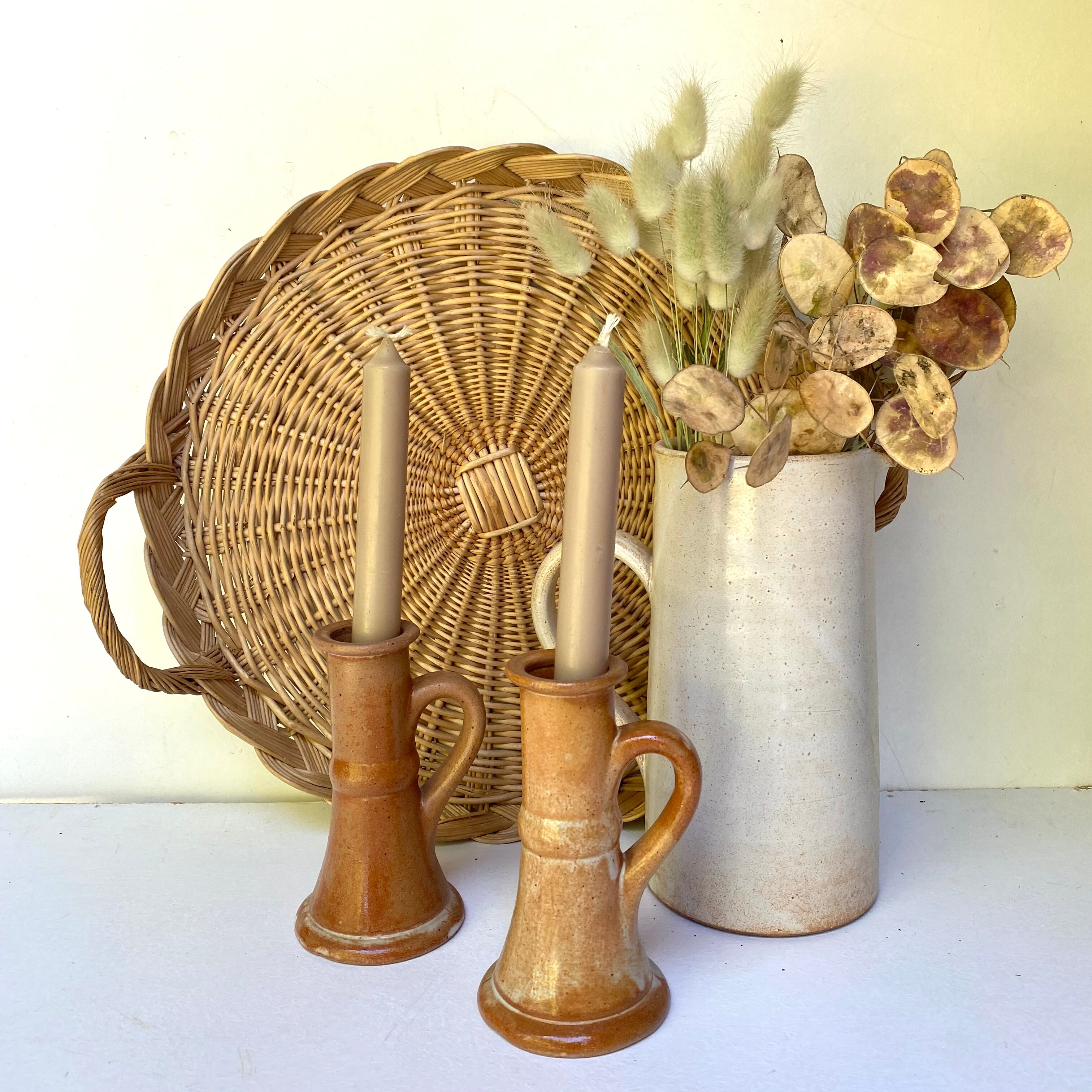 Pair of bohemian sandstone candle holders