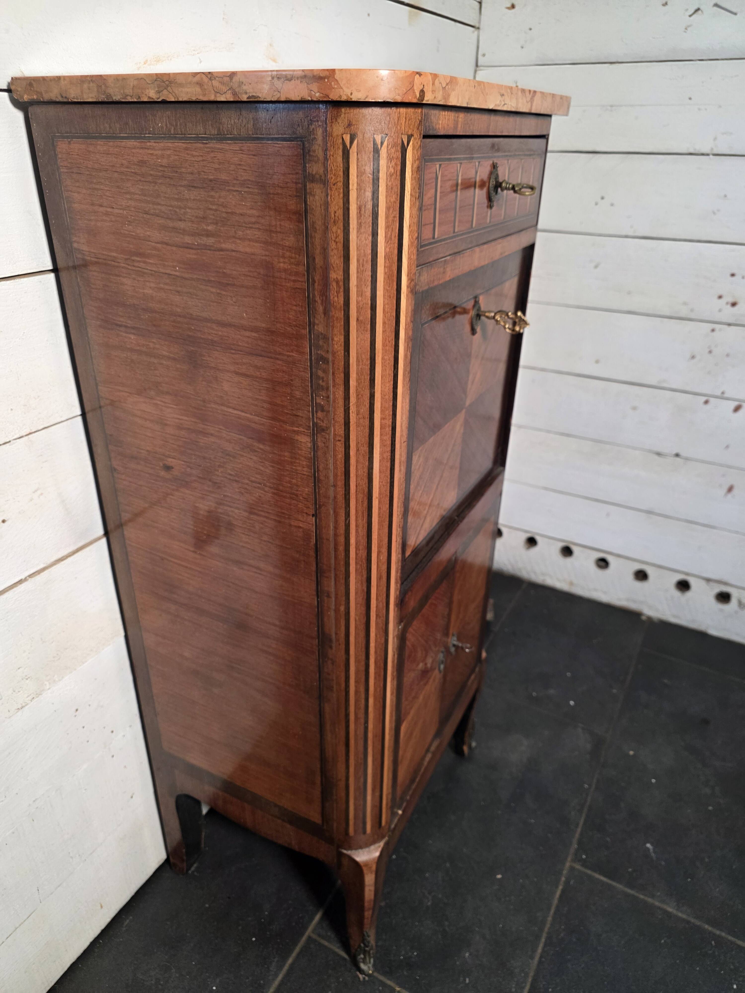 Louis XV style secretary with marquetry and marble top.