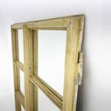 Vintage wooden window converted to a mirror