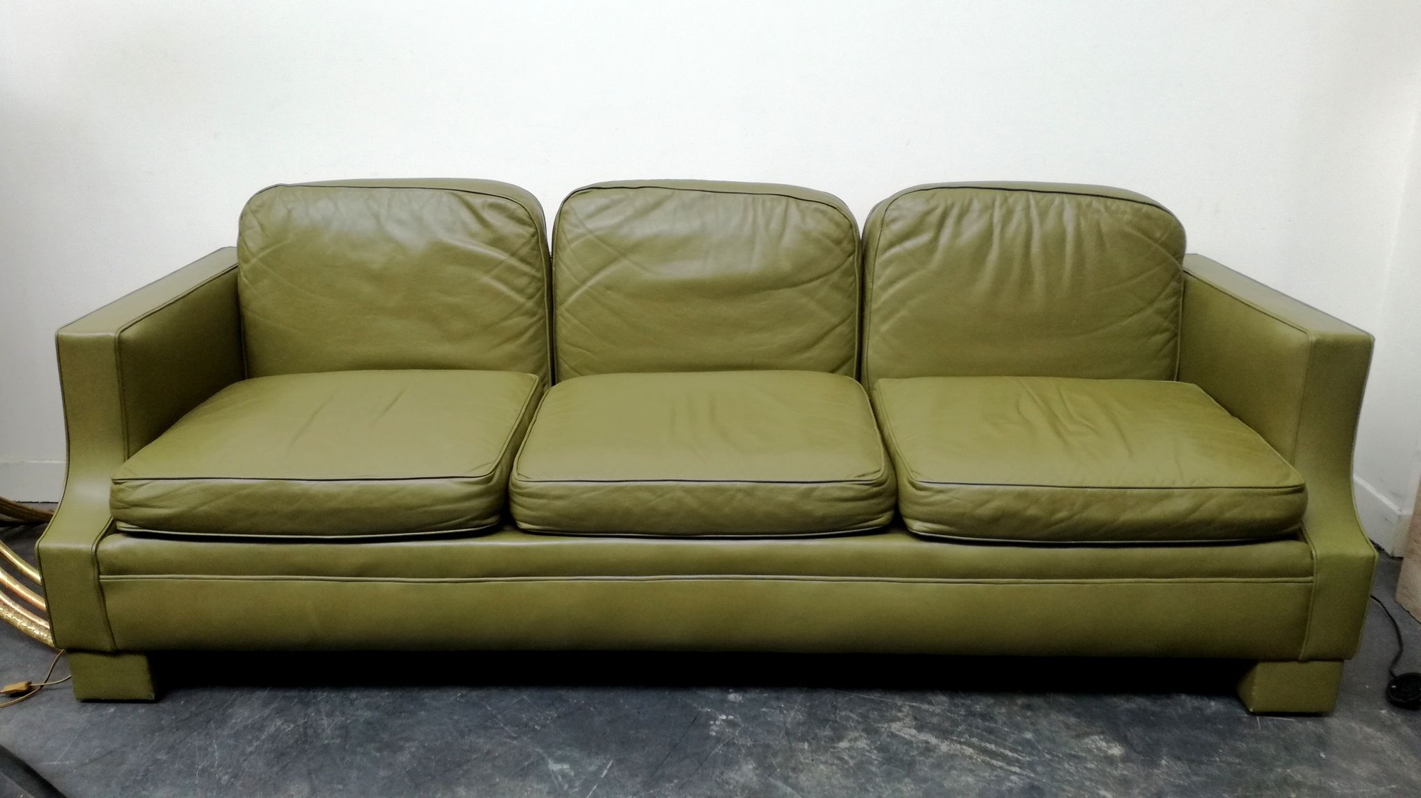 Jansen Olive green leather sofa France 1970