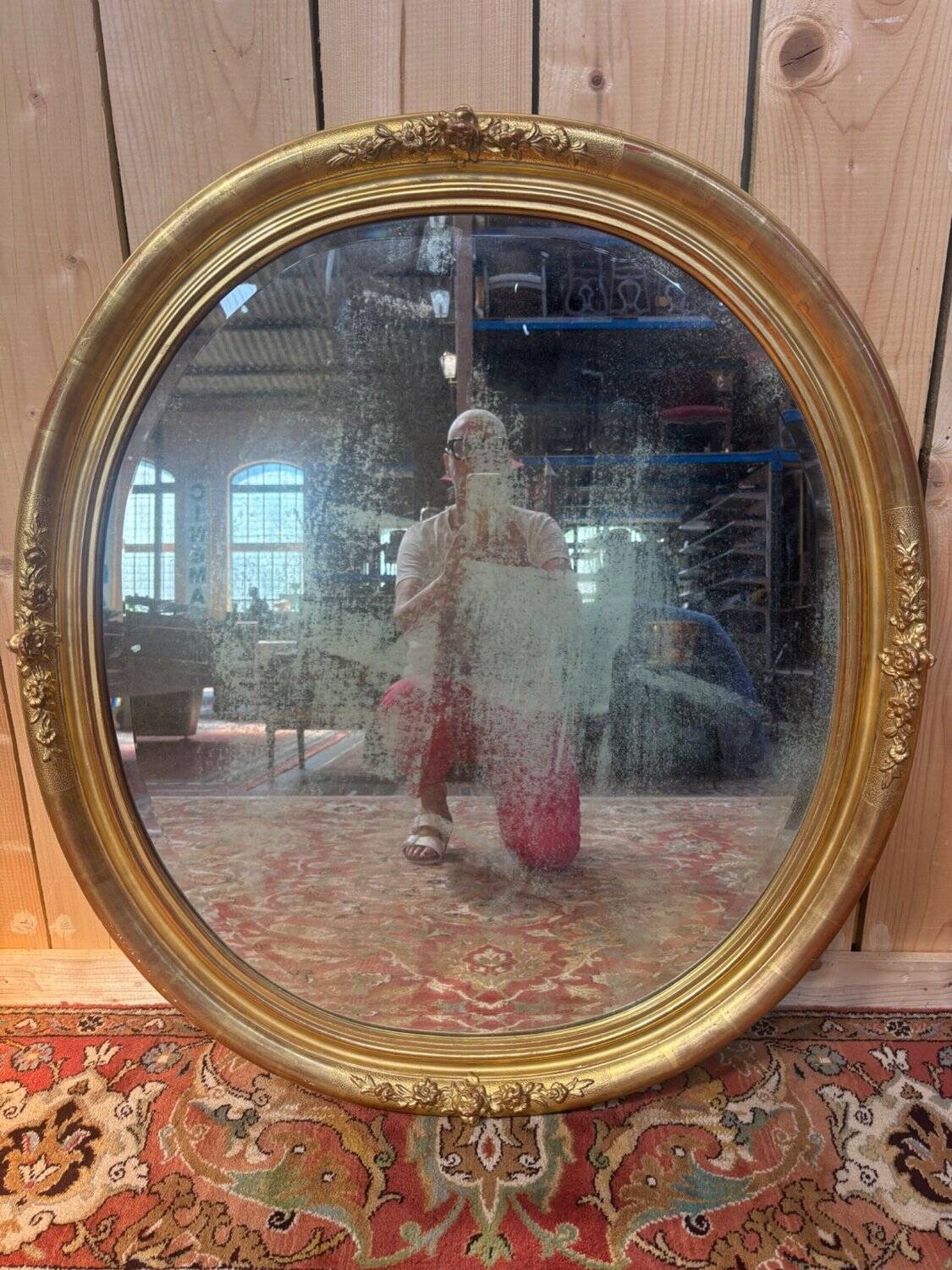 Miroir ovale biseauté bois doré style Louis XVI XIXe siècle
