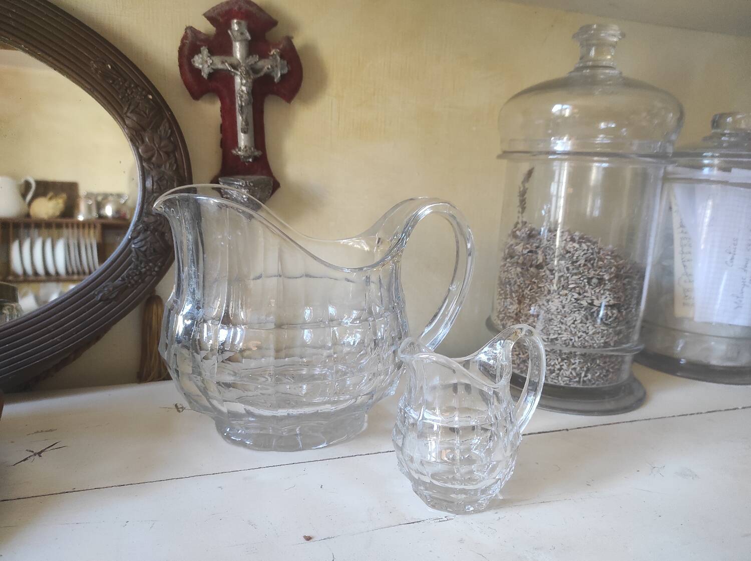 2 antique glass pitchers