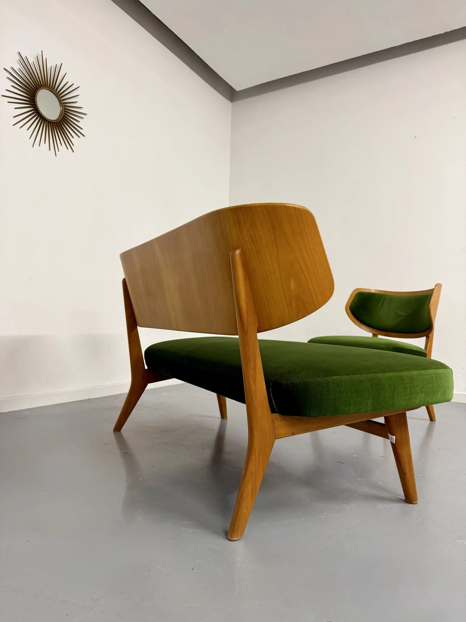 Sofa and armchair designed by Herta-Maria Witzemann, moulded wood, 1960s.