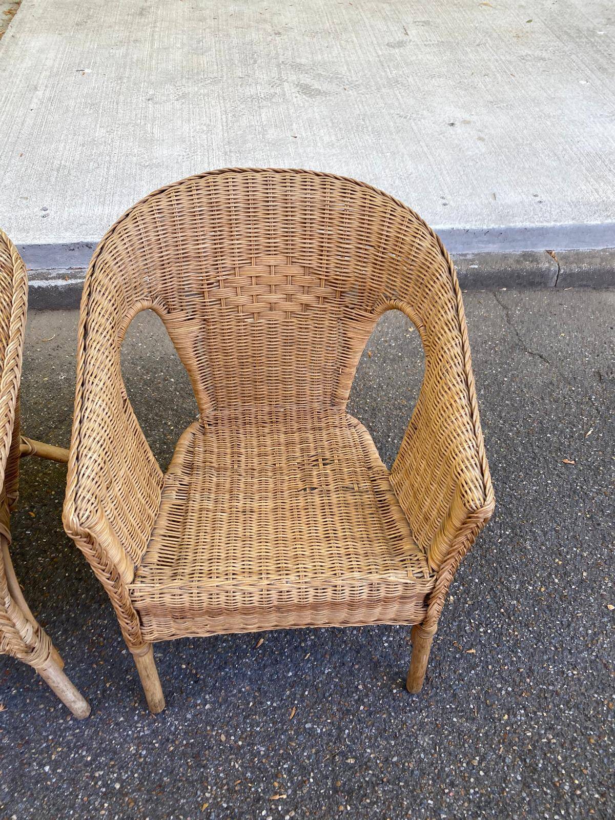 Rattan and woven wicker armchair in vintage bohemian style