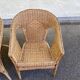Rattan and woven wicker armchair in vintage bohemian style