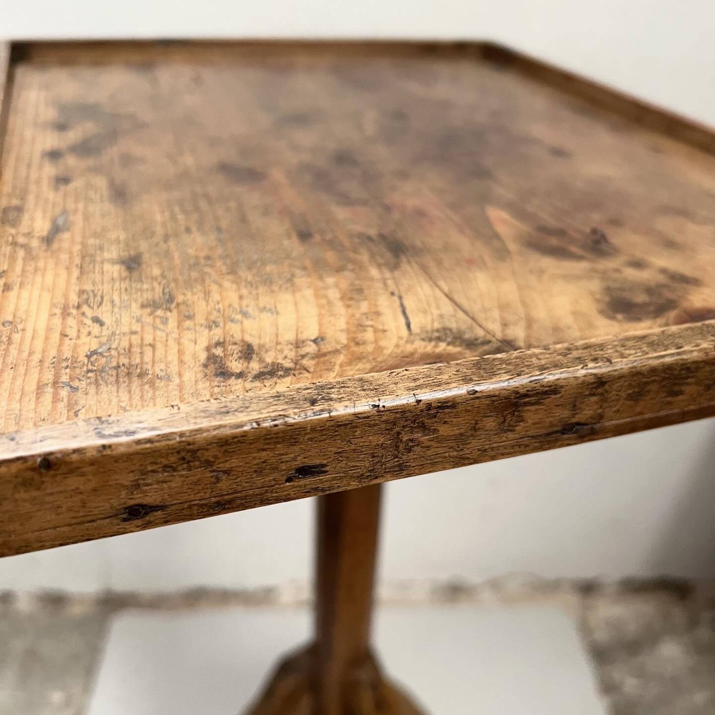 Old primitive wooden tripod pedestal table