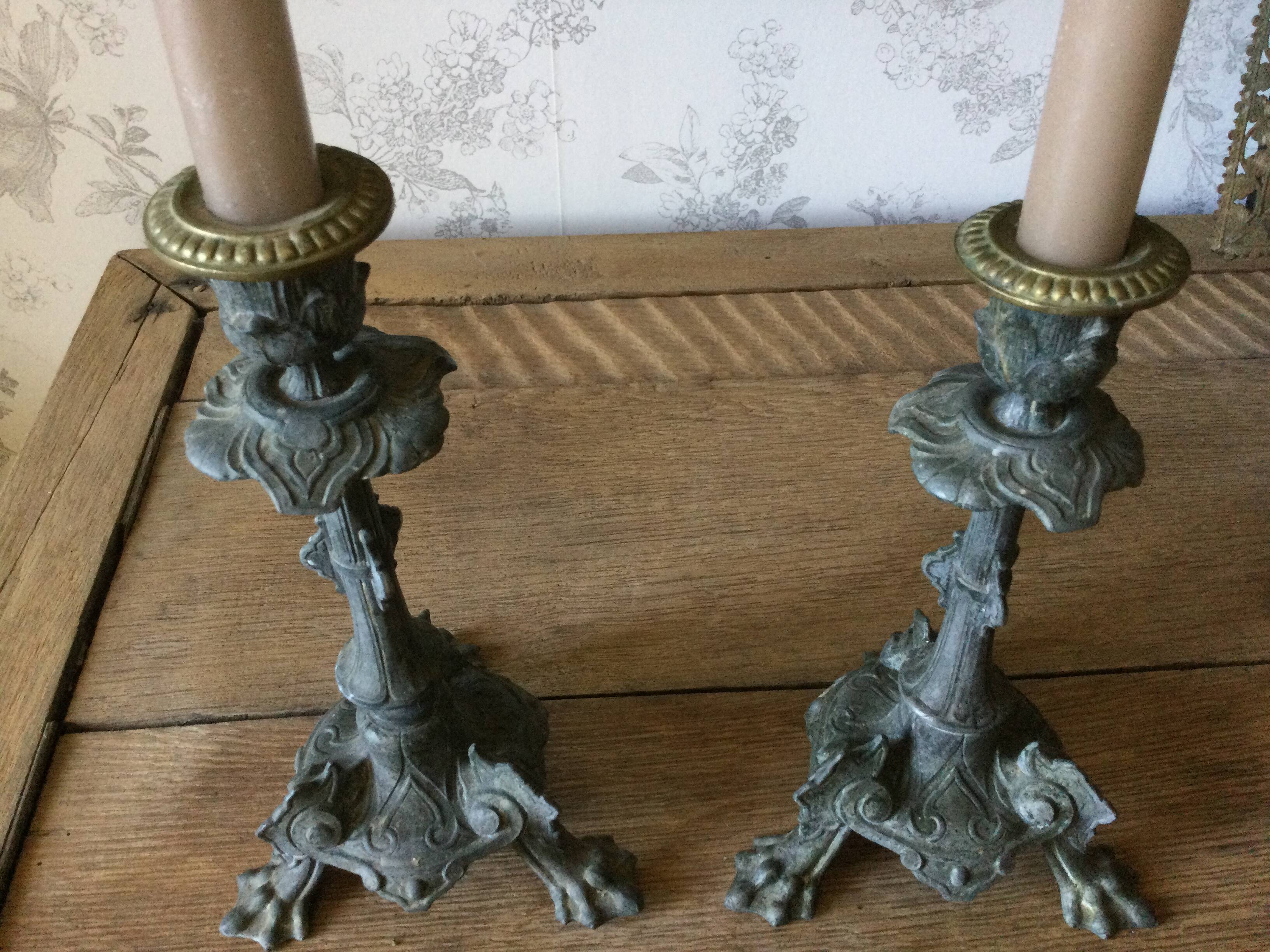 Set of 2 antique candlesticks in spelter.