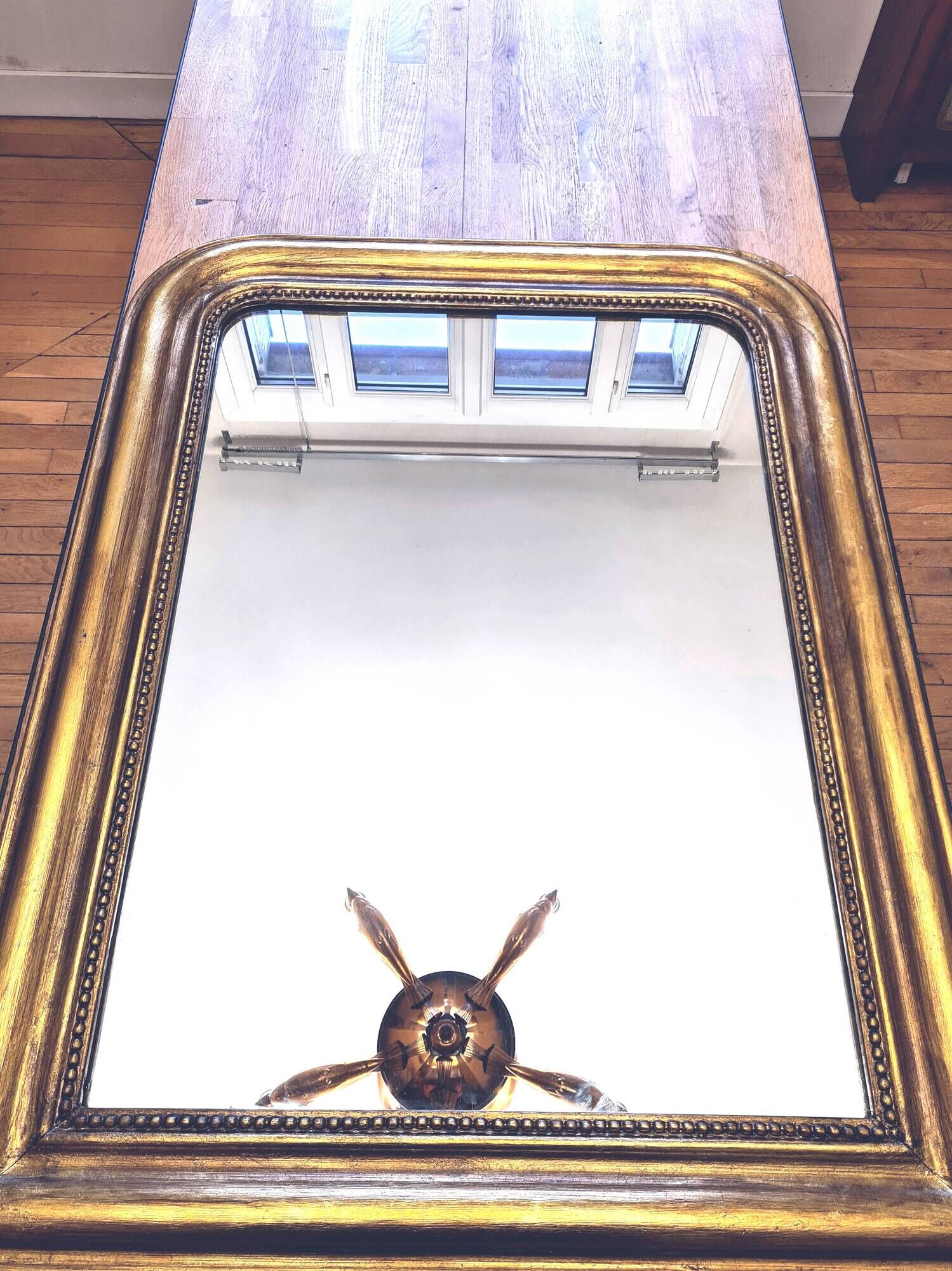 Old large Louis Phillipe mirror, gilded with gold leaf - Emilien"