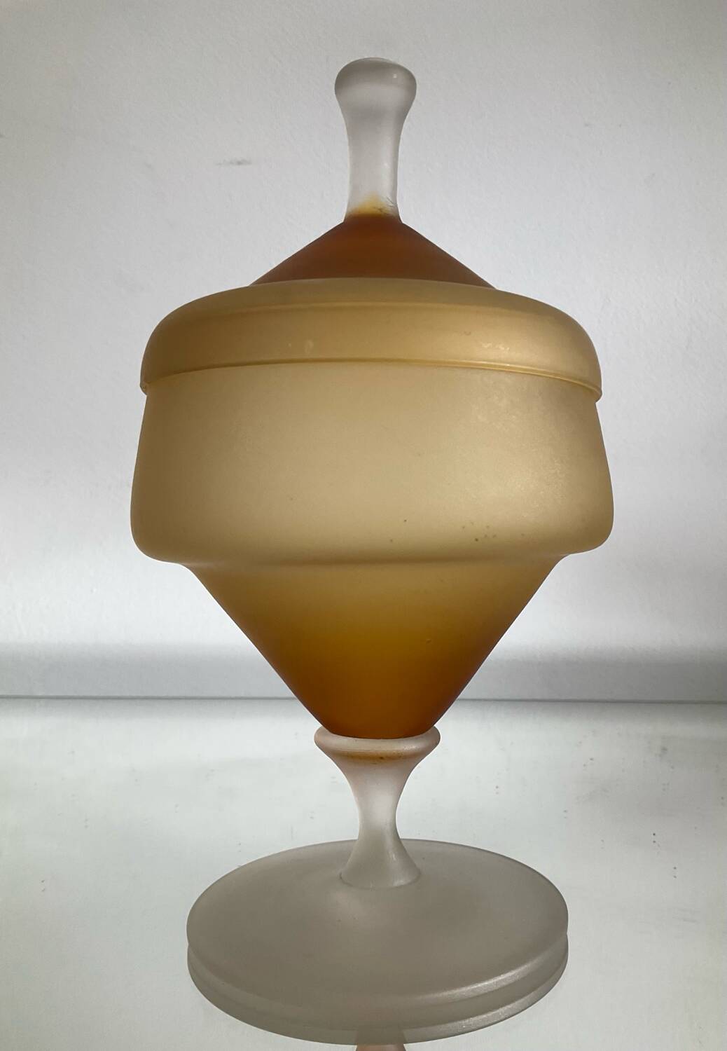 Vintage blown glass candy box on a stand