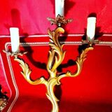 Pair of rococo style gilded bronze sconces with 3 light arms