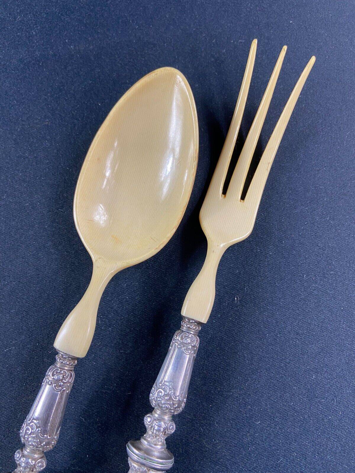 Salad service silver handles Regency decoration with cherub heads