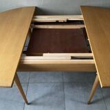 Vintage round table from the 60s with butterfly extension