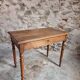 Antique French writing table in walnut with a drawer, circa 1900.