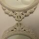 2 off-white oval plaster frames