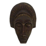 Masque en terre cuite de style africain signé Siki