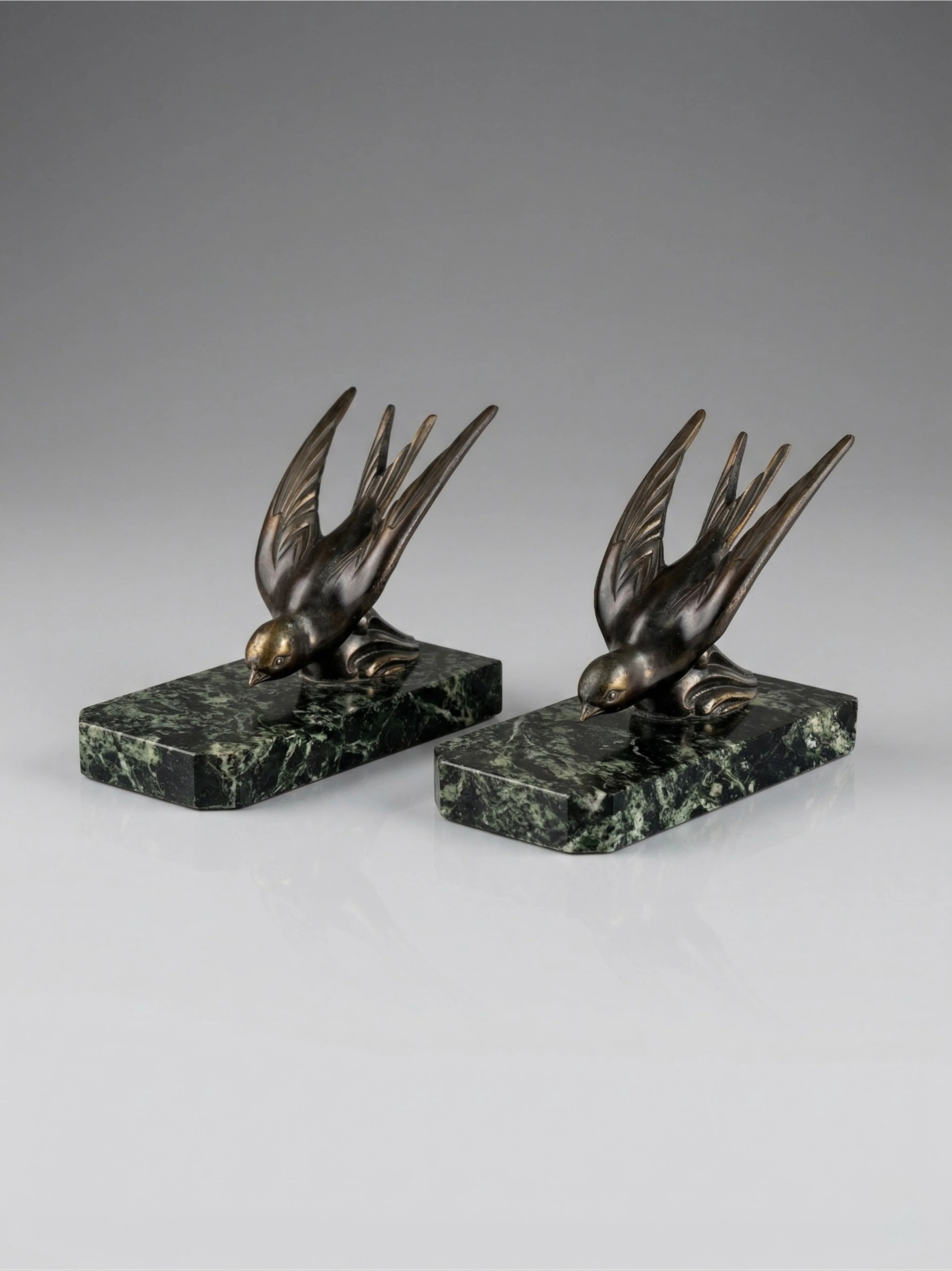 Art Deco bookends – Swallows in spelter on marble bases