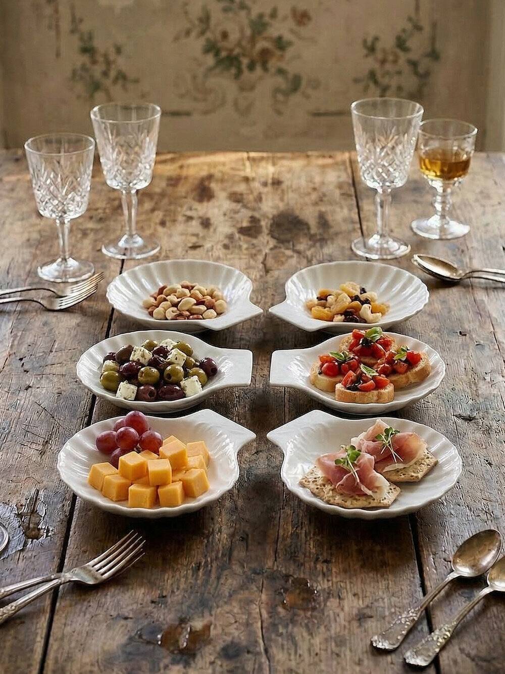 Set of 6 shell-shaped bowls in Limoges porcelain by Philippe Deshoulières.