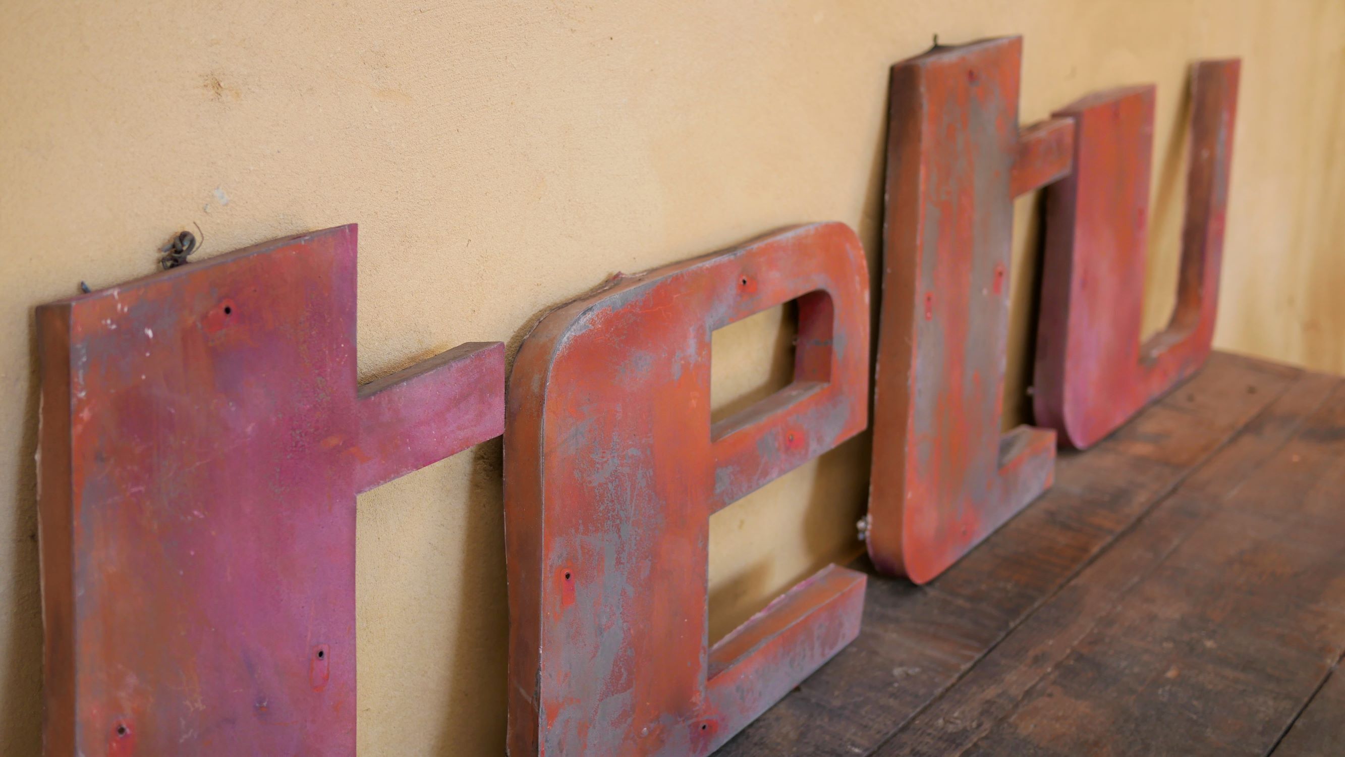 Letter to sign vintage metal "U".