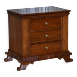 Set of hardwood dressers with finely carved bases.