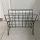 Black metal wire magazine rack
