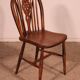 Lot de 10 chaises Windsor à dossier en roue du XIXe siècle
