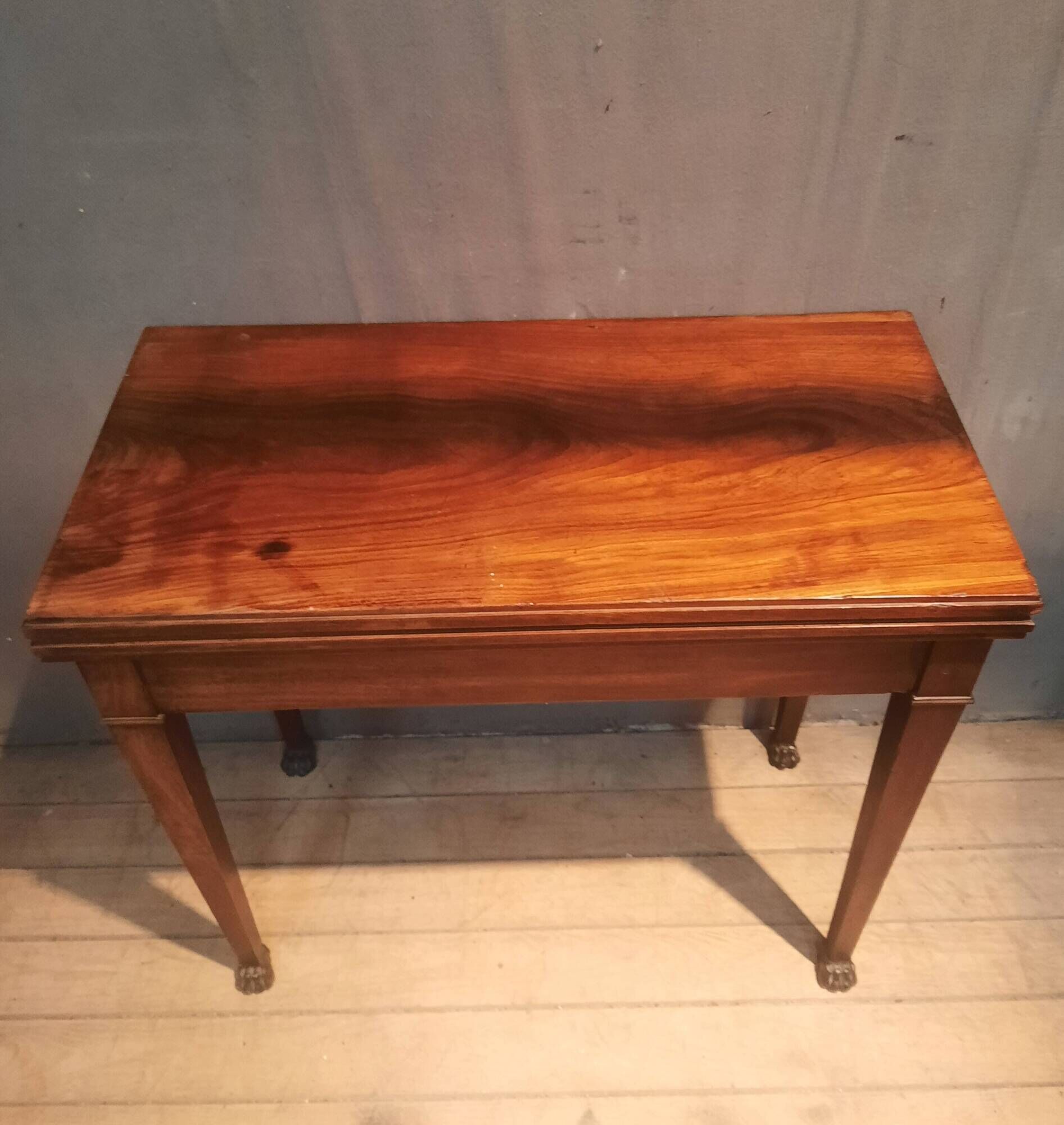 Rectangular console that transforms into a game table.
