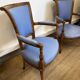 Paire de fauteuils de style Louis XVI en bois sculpté