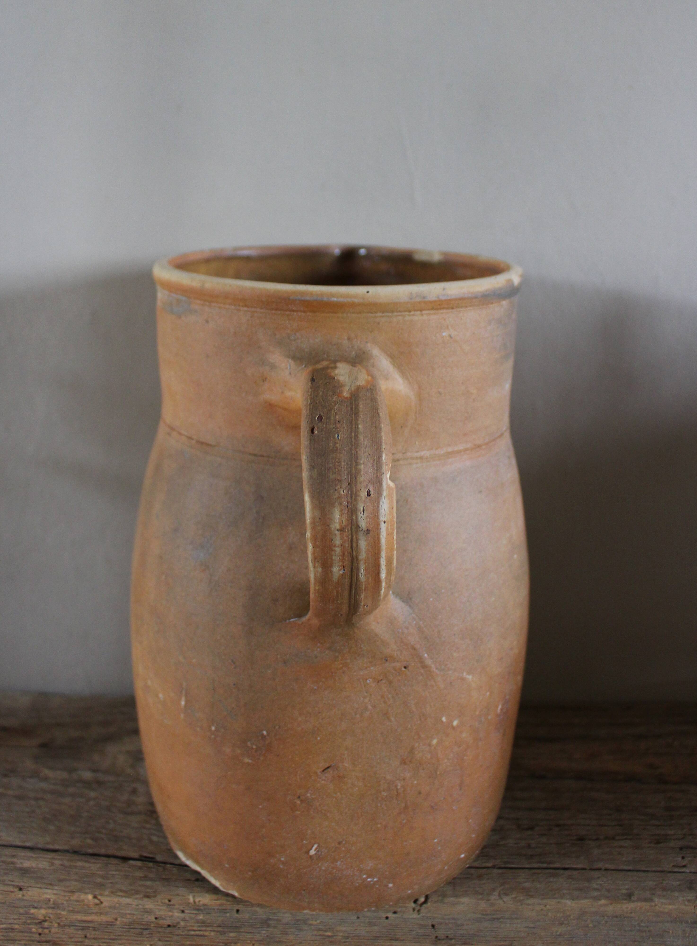 Vintage artisanal terracotta jug