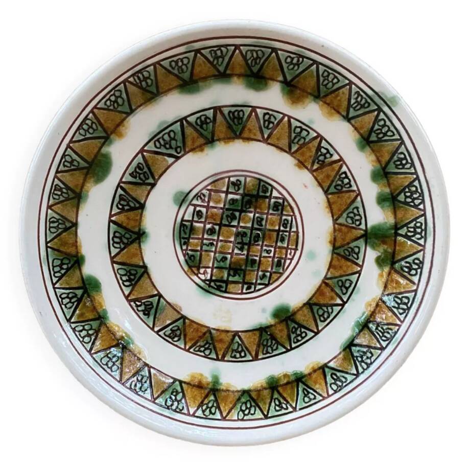 Plate with scarified decoration, signed CHS, Cyprus