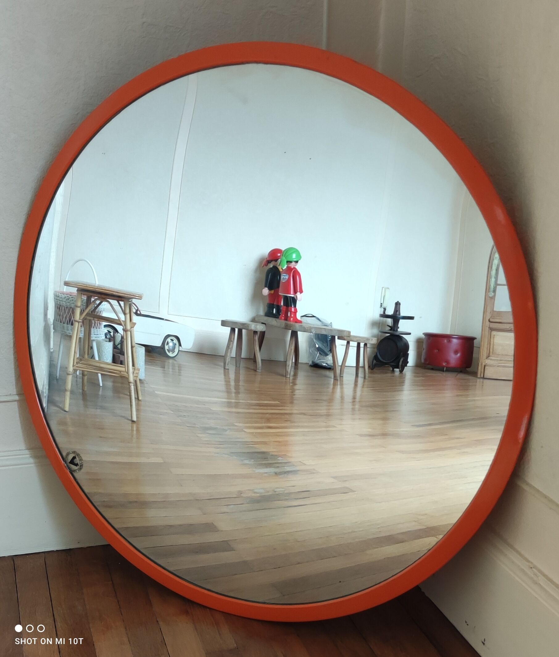 Convex vintage orange mirror