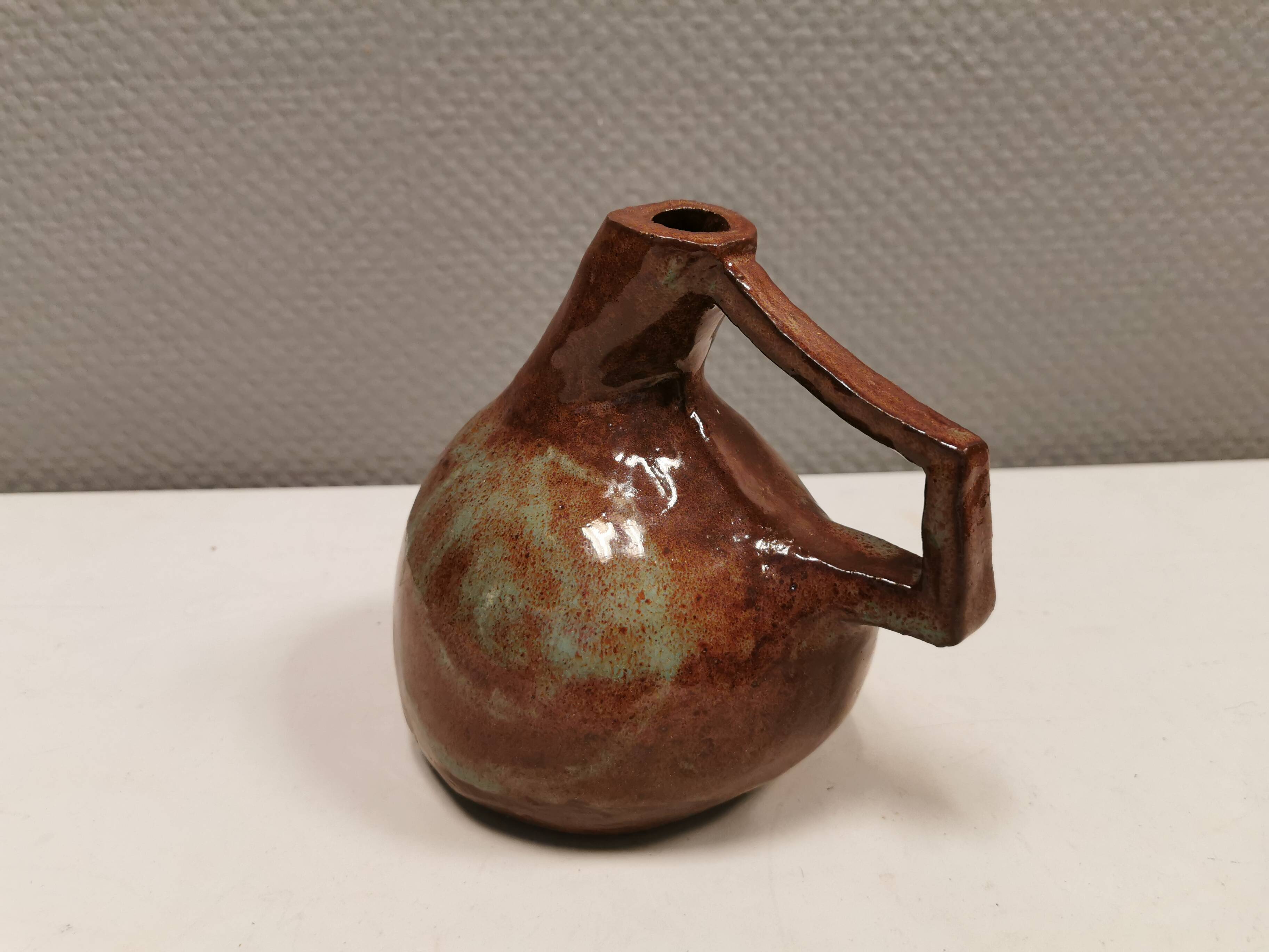 Ceramic jug/vase, Danish in beautiful earthy brown colours with light blue/green details.