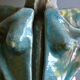 Surreal ceramic sculpture in relief signed to be identified.
