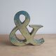 Ancient iron letter
