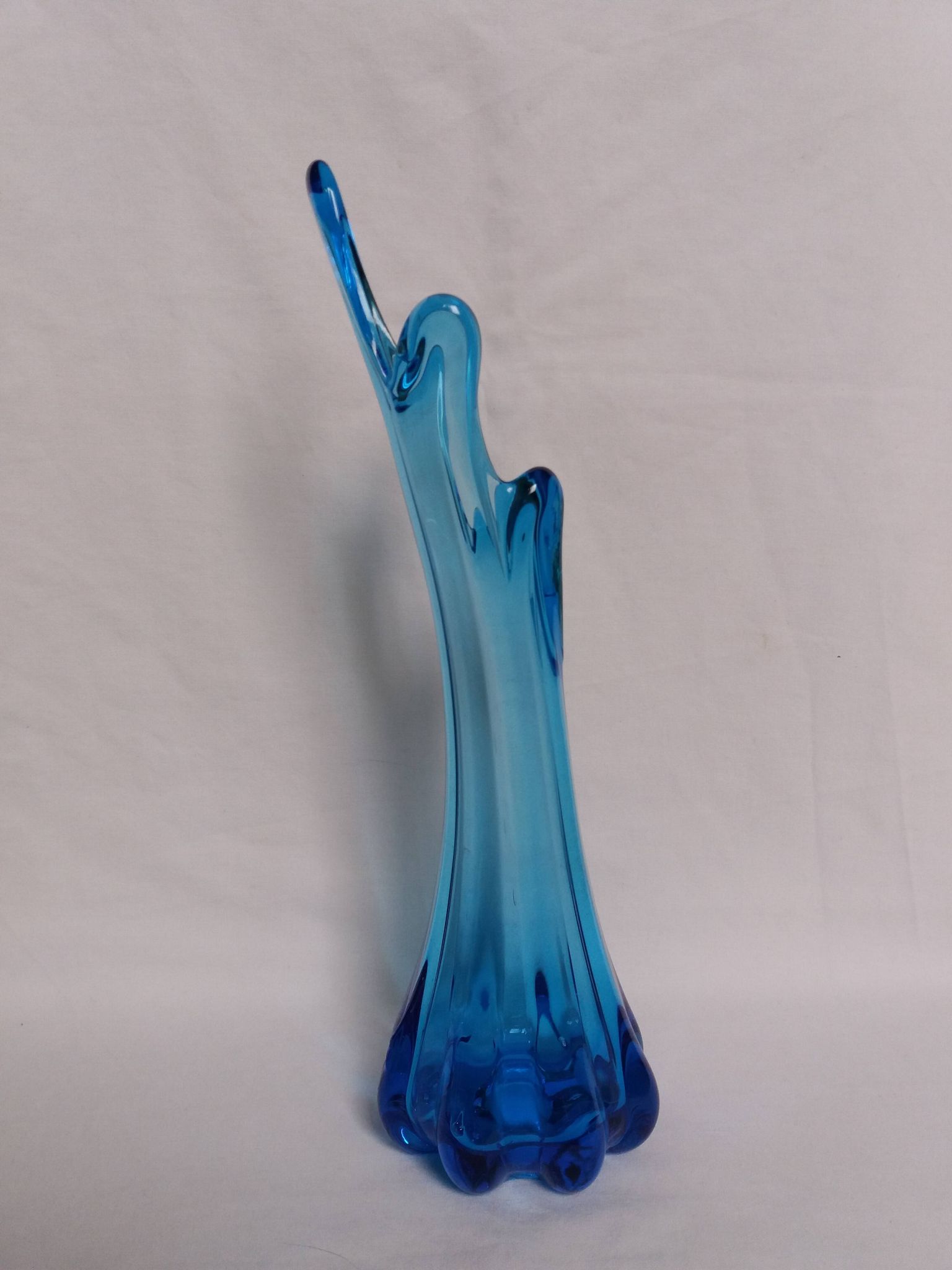 Turquoise blue blown glass vase